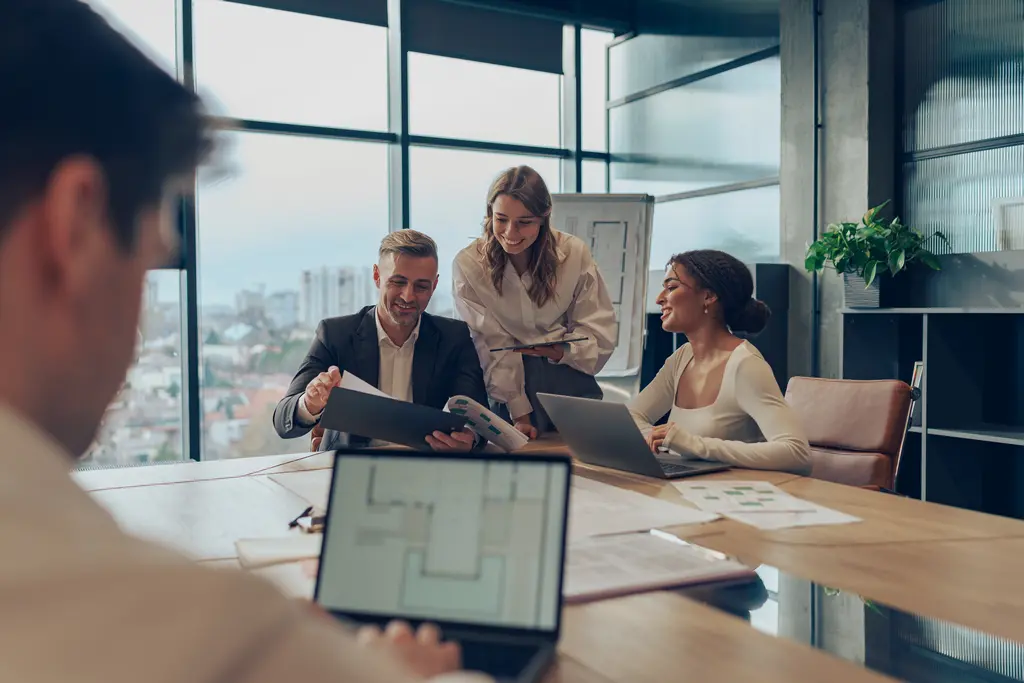 At 50 people, standardize how work moves between teams so tools do not create new silos